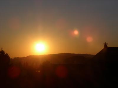 Sonnenuntergang mit Linsenflecken
